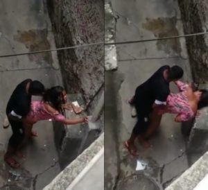 Negra pillada rapando en la calle de toque de queda